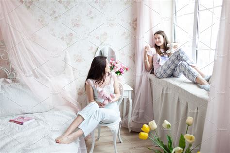 Mother And Daughter In Light Bedroom High Quality People Images
