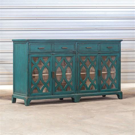 Four Door Cabinet With Lattice Work And Glass Panels
