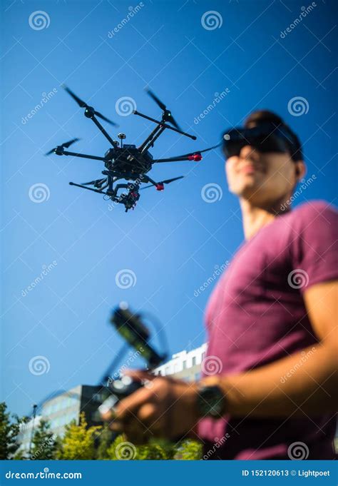 handsome young man flying  drone outdoors stock image image  pilot helicopter