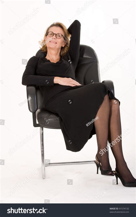 older secretary with glasses relax during the lunch break mature
