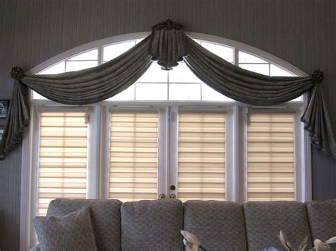 formal swag draperies  medallions  illusions transitional shades curtains  arched