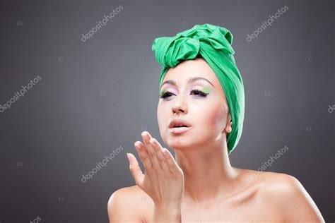 Sexy Pin Up Woman With Green Scarf On Head Sending Kiss