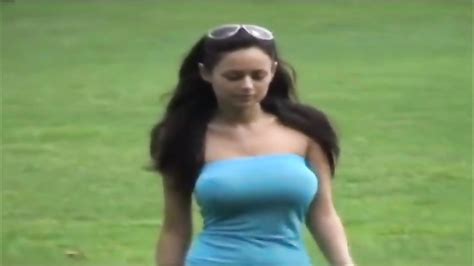 beautiful goddess s huge tits bounce as she walks in the park