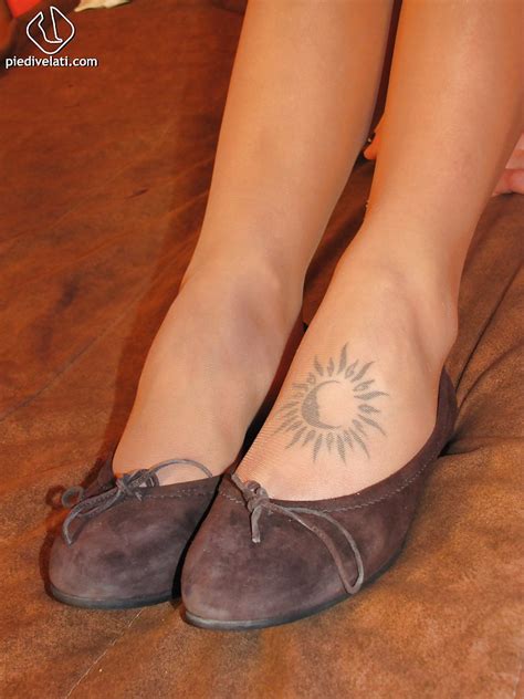 cute babe carla will gladly show you her cute tattoo on her foot