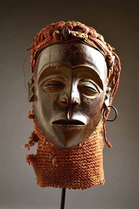 africa mask   chokwe people  angola  dr congo wood beads pigment buttons