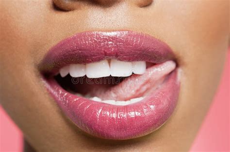 Cropped Image Of Woman Licking Pink Lipstick Stock Image Image Of