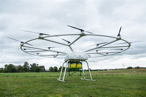 volocopter designed  giant agricultural drone sprayer  john deere