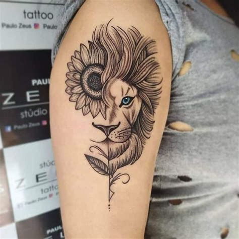 A Lion With A Sunflower Tattoo On The Arm