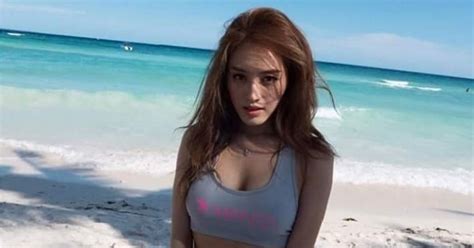 fans compile sexy photos of rainbow jaekyung s vacation