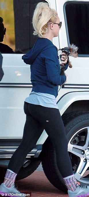 britney spears exposes her bottom in ripped leggings at the beverly