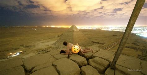 this couple engaged in adult cuddle atop the great pyramid of giza in