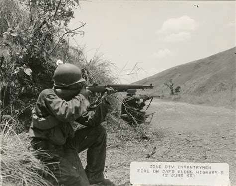 division infantrymen fire   japanese  highway