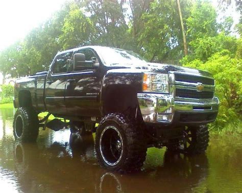 jacked  chevy truck yeah gm rules pinterest big cars