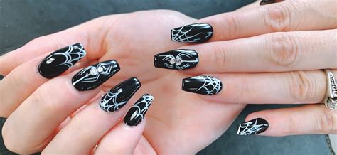 halloween nail design  black color click  book