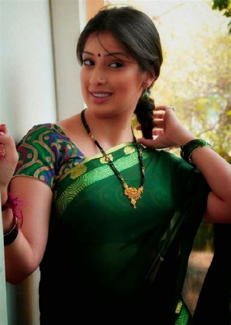 raai lakshmi looks marvelous in green saree as a role of housewife