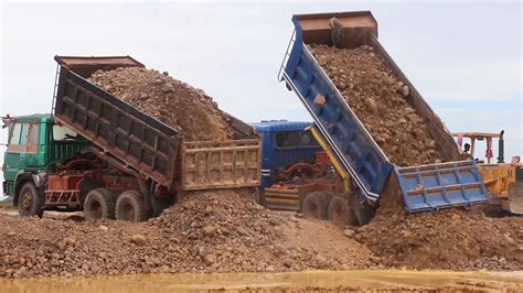 amazing fastest unloading dirt dump trucks  wheels bulldozer
