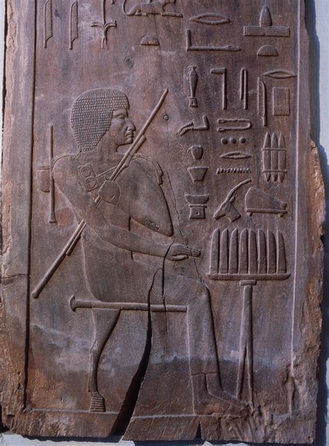 Wood Panel With Reliefs Depicting Hesire An Egyptian