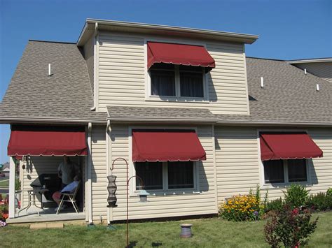 window awnings showing   awnings provide shade    window kreiders canvas