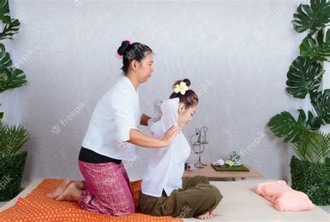 Premium Photo Asian Woman Getting Traditional Thai Stretching Massage