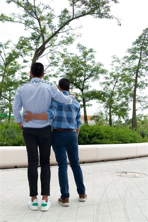 Latino Gay Men Couple Hugging In Jalisco Mexico Gay Concept Stock