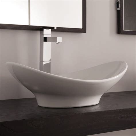 oval shaped white ceramic vessel sink   shower faucet