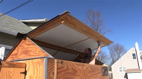 man builds cheap diy micro camper