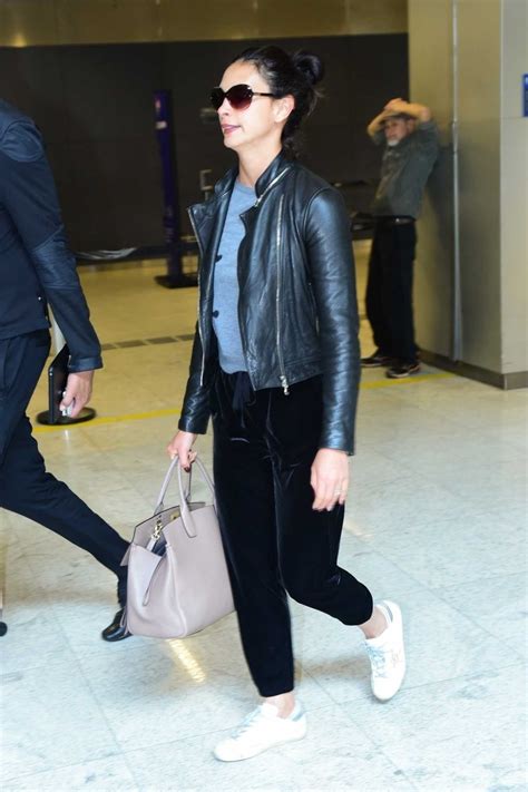morena baccarin in a black leather jacket arrives at guarulhos