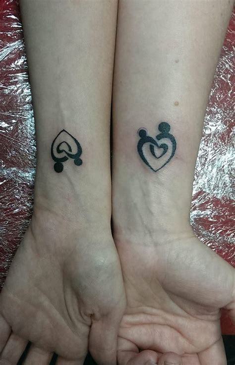 adorable mother daughter tattoos    mother