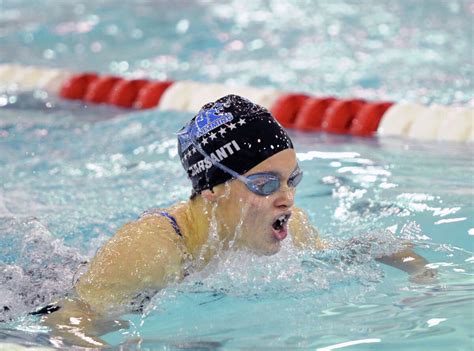 darien wins fciac girls swim title as records fall