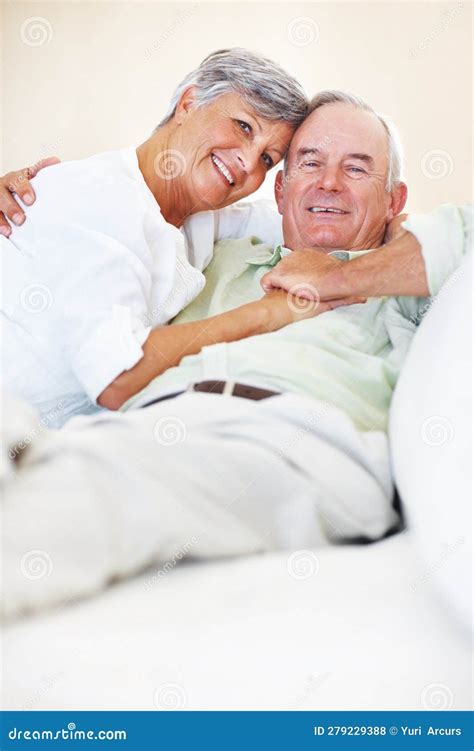 loving mature couple relaxing at home portrait of loving mature couple