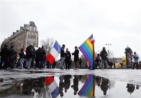 french president francois hollande signs gay marriage bill into law