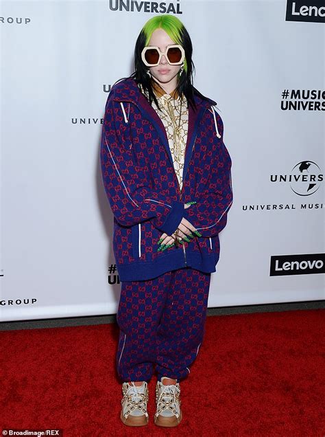 billie eilish is pictured without trademark baggy clothes as she steps