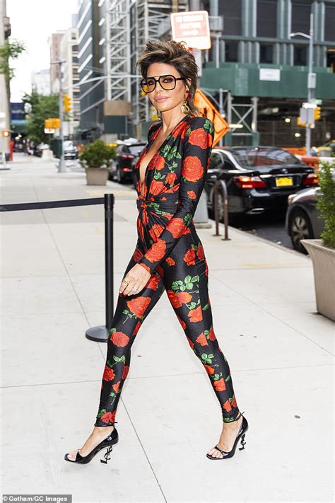 lisa rinna dons plunging rose print ysl catsuit to pre tape bravo s