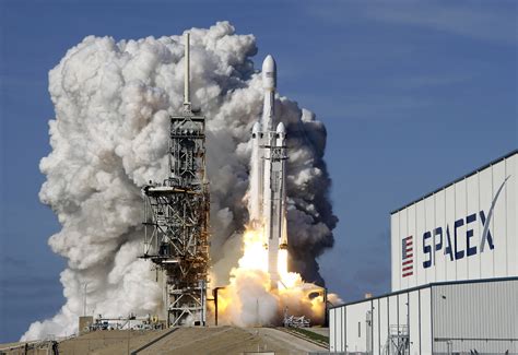 spacexs big  rocket blasts  puts sports car  space chicago tribune