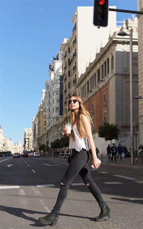 stylish girl walking  street  stocksy contributor milles studio stocksy