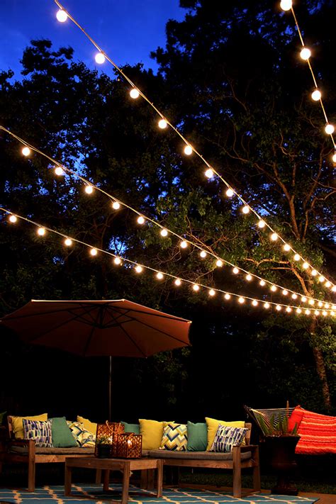 canopy  string lights   backyard gray house studio