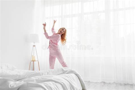 Beautiful Blonde In Pajama Waking Up In Morning Happy Young Lady