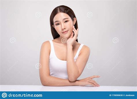 Beautiful Asian Woman Looking At Camera Smile With Clean And Fresh Skin