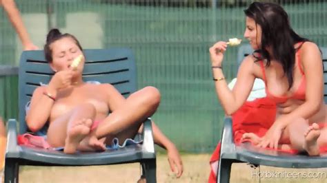sexy topless babes tanning at the pool eporner