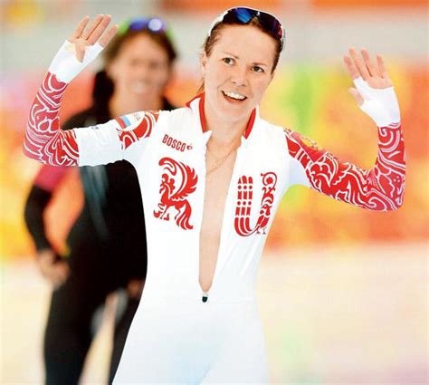 delighted russian skater unzips suit to nearly bare it all