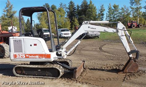 bobcat  mini excavator  shevlin mn item dx sold purple wave