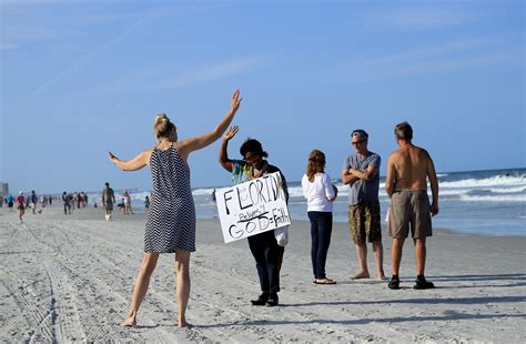 floridas beaches flooded  people  minute  reopen  donald trump fuels demos