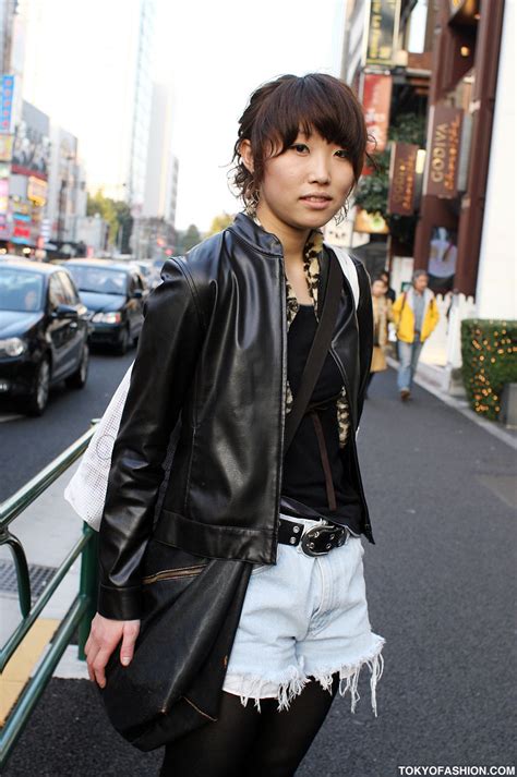 Japanese Girl In Cut Off Shorts And Leather Jacket