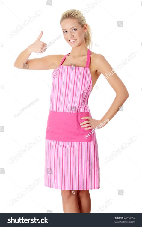 happy blond nude woman in pink apron isolated on white