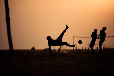 30 action packed photos of people playing football soccer