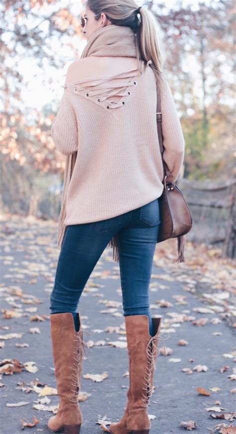 casual sweater and leggings outfit lace up sweater and suede boots