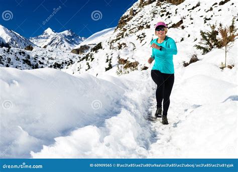 woman running  winter mountains stock image image  hiker