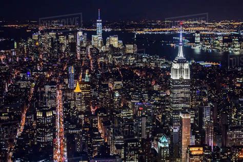 usa  york  york city manhattan aerial view  illuminated skyline  night stock