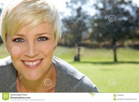 beautiful blond girl with a pretty smile royalty free