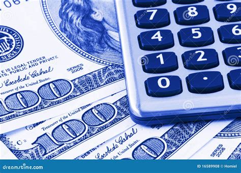 calculator   dollars stock photo image  currency